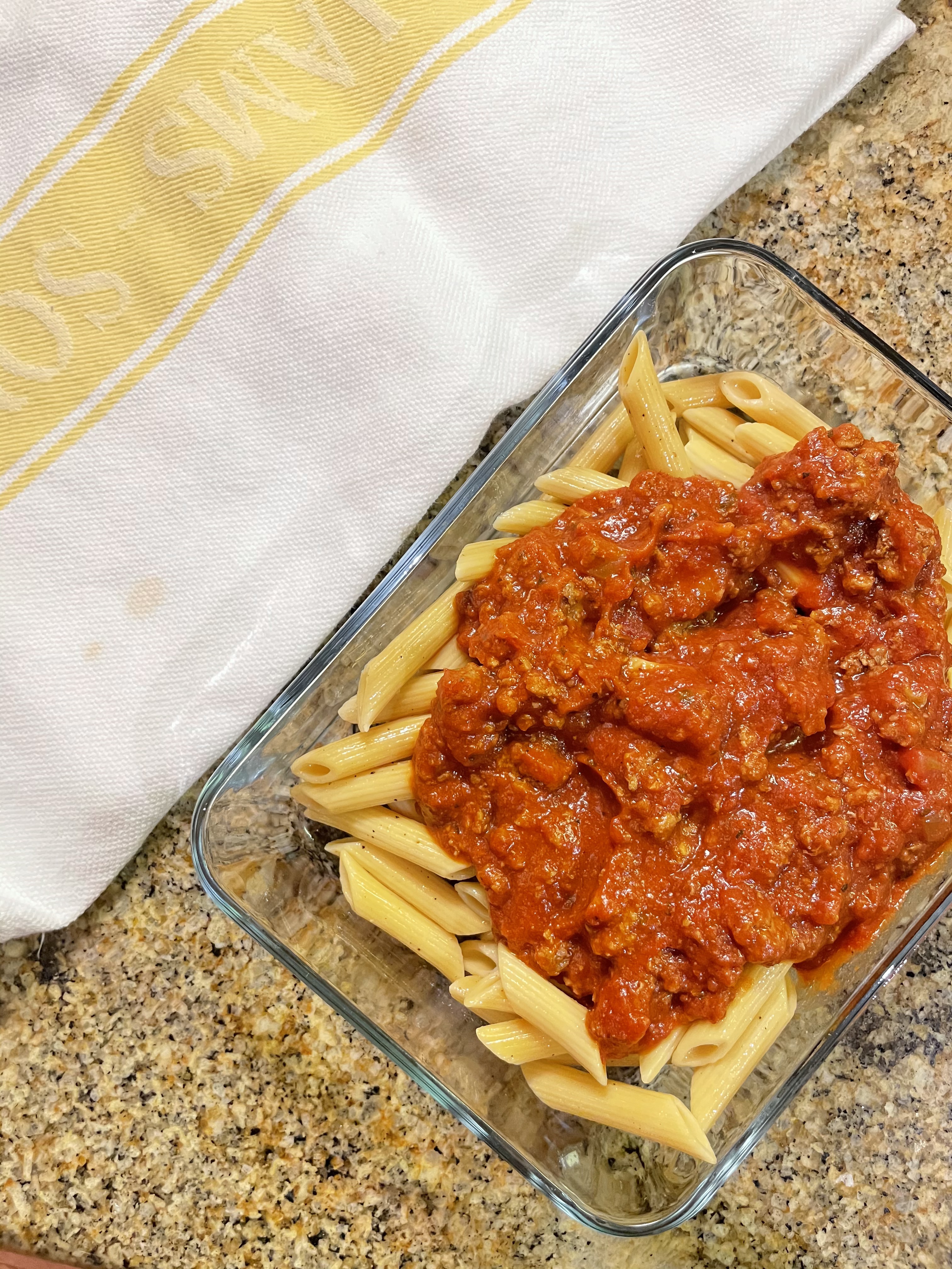 Leftover bean pasta with meat sauce makes a perfect lunch for the next day.